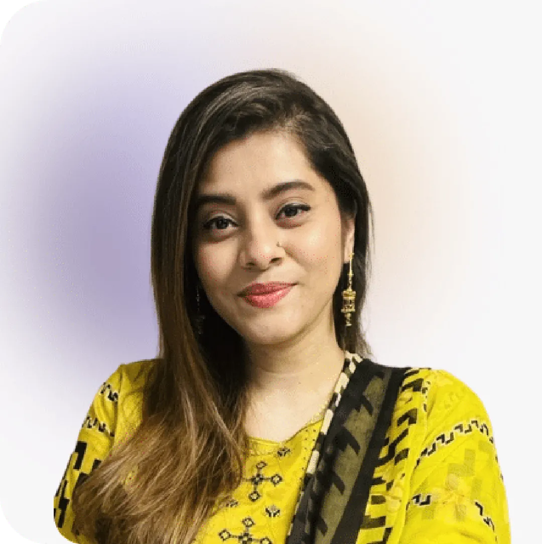 Mahjabeen, Marketing Associate, in yellow ethnic wear with patterns, on a soft gradient background.