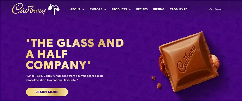 Cadbury homepage with purple background, chocolate piece, and bold slogan about brand heritage.