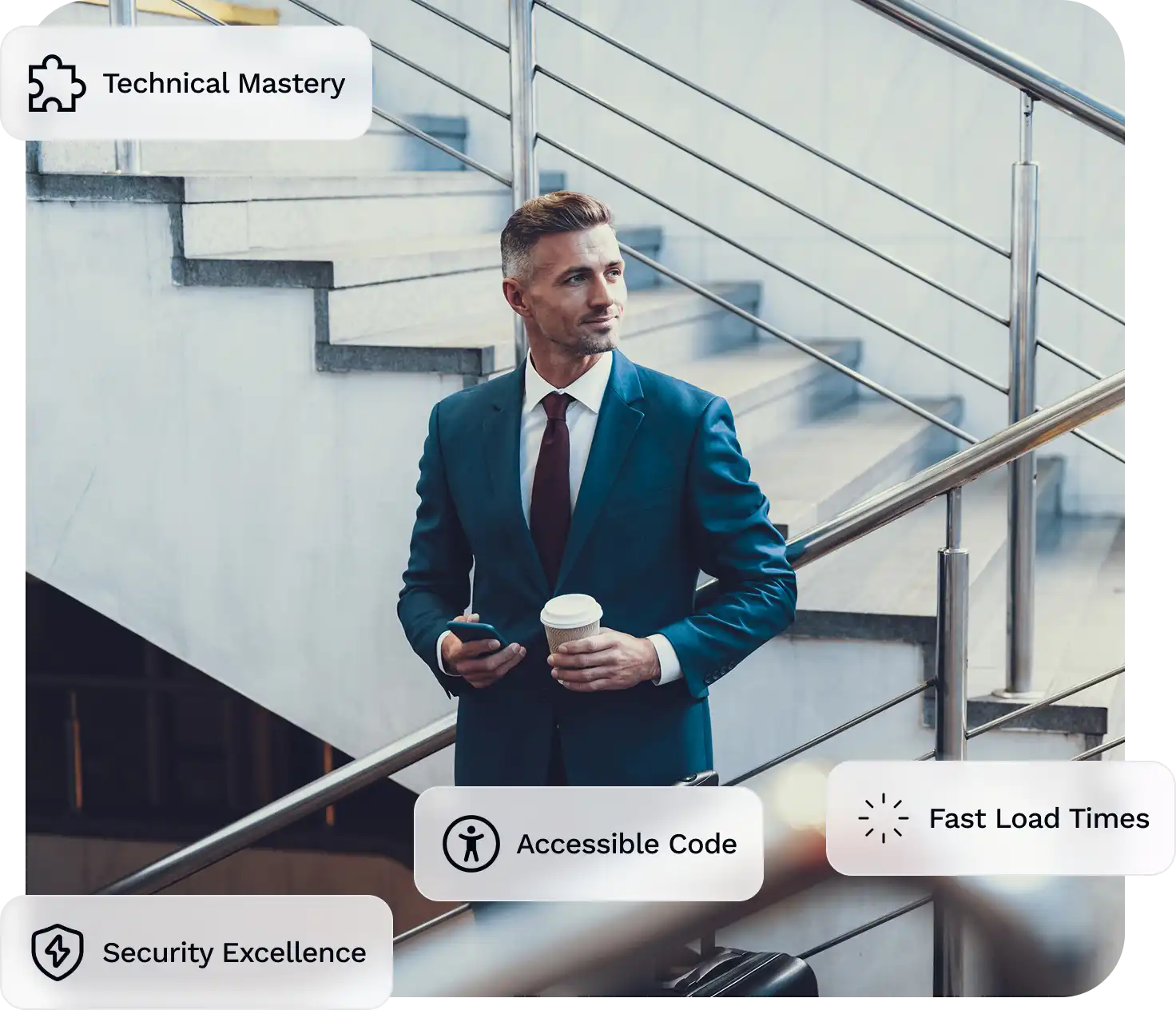 A man in deep blue formal dress-up holding a phone and coffee on a stair looking to his right.