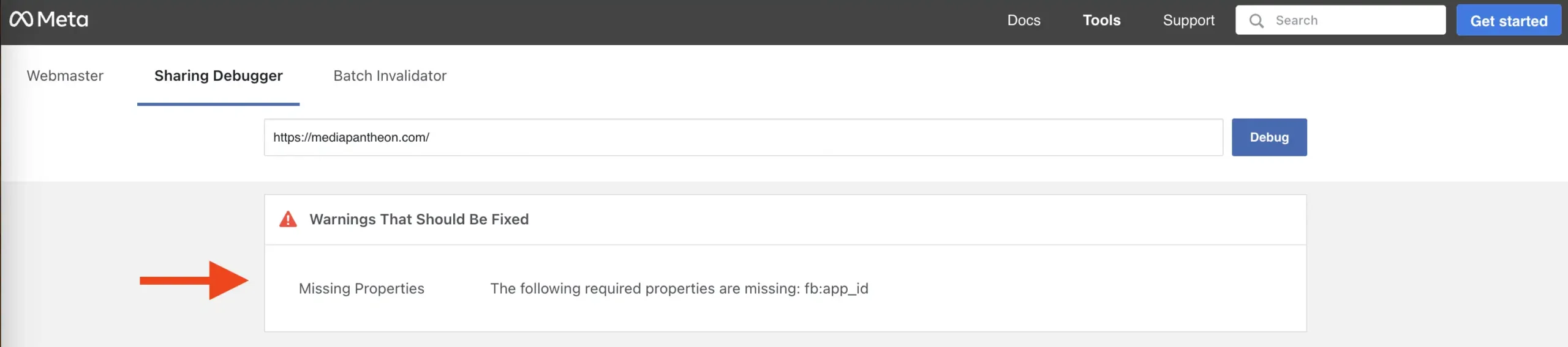 Sharing Debugger showing a warning for missing properties, highlighted with a red arrow.